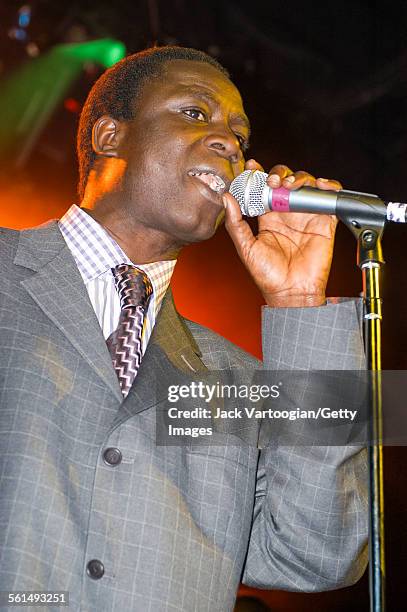 Senegalese Mbalax musician Thione Seck and his band Raam Daan perform onstage at Irving Plaza, New York, New York, Friday, February 14, 2003.