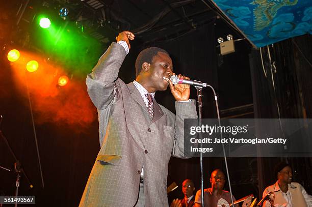 Senegalese Mbalax musician Thione Seck and his band Raam Daan perform onstage at Irving Plaza, New York, New York, Friday, February 14, 2003.