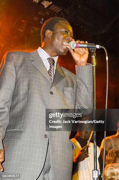 Senegalese Mbalax musician Thione Seck and his band Raam Daan perform onstage at Irving Plaza, New York, New York, Friday, February 14, 2003.