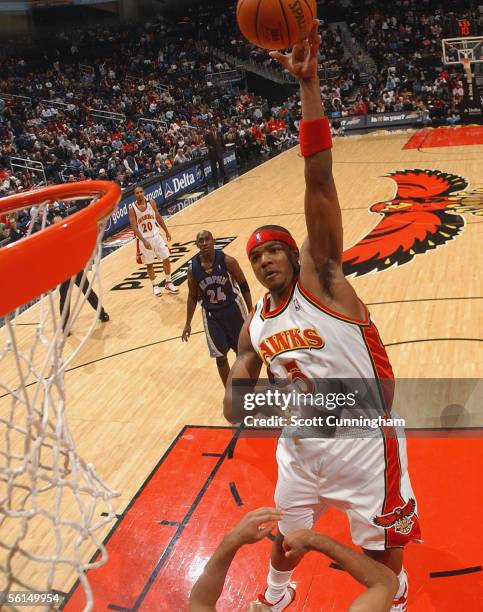 Josh Smith of the Atlanta Hawks shoots against the Memphis Grizzlies on November 12, 2005 at Philips Arena in Atlanta, Georgia. NOTE TO USER: User...