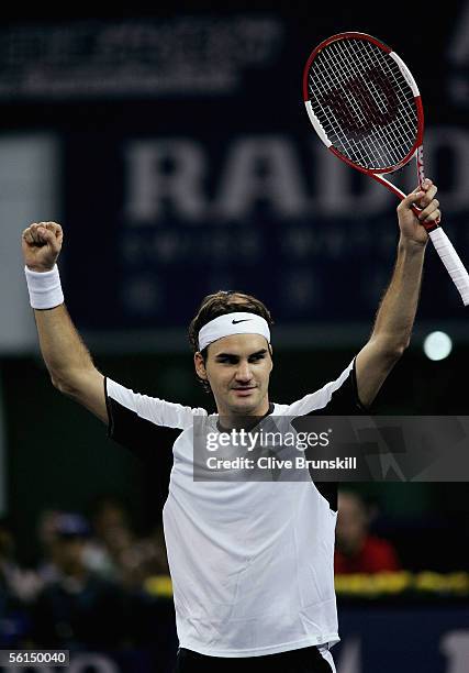 Roger Federer of Switzerland celebrates his three set victory against David Nalbandian of Argentina in his first match of the round robin during the...