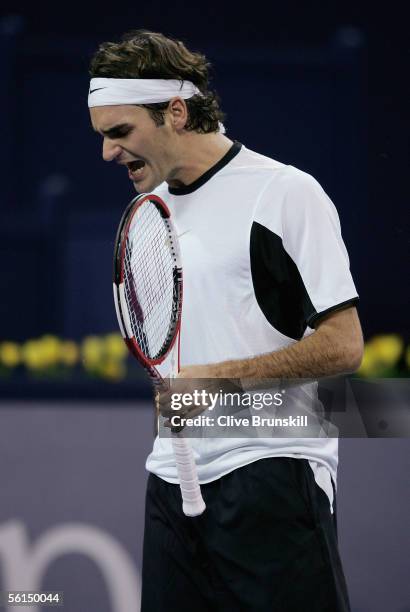 Roger Federer of Switzerland reacts during his first match of the round robin against David Nalbandian of Argentina at the Tennis Masters Cup, at the...