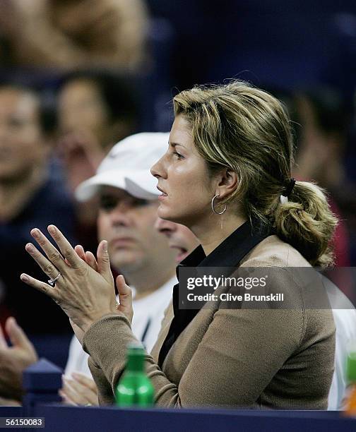 Roger Federer's girlfriend Mirka Vavrinec applauds a point during his match against David Nalbandian of Argentinain his first match of the round...