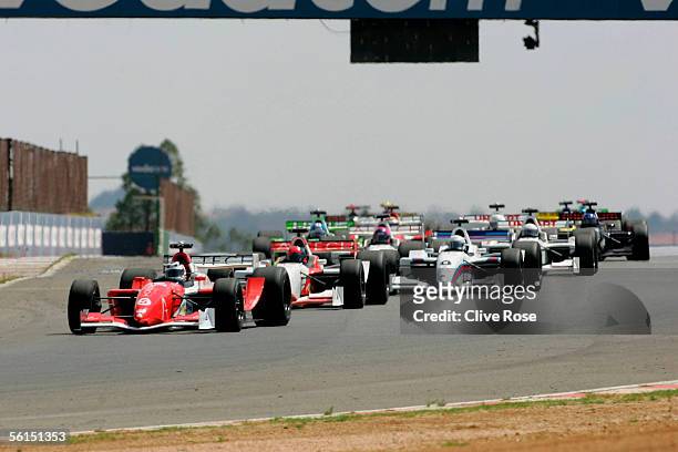 Nigel Mansell of Great Britain leads from the start of the Grand Prix Masters race at the Kyalami Circuit on November 13, 2005 in Johannesburg, South...