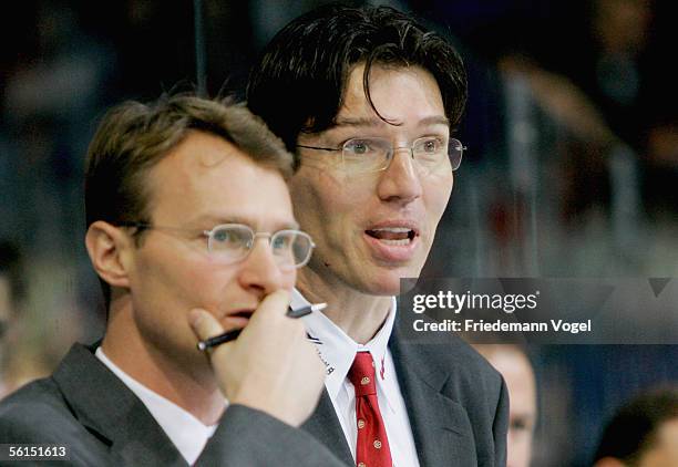 Coach Greg Poss and second Coach Uwe Krupp of Germany reacts during the TUI Nations Cup match between Canada and Germany at the TUI Arena on November...