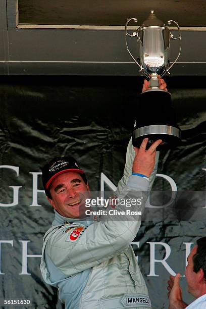 Nigel Mansell of Great Britain celebrates winning the Grand Prix Masters race at the Kyalami Circuit on November 13, 2005 in Johannesburg, South...