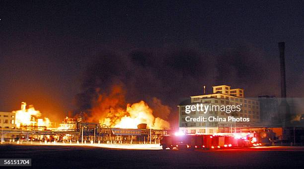 Fireball erupts from the Jilin Petroleum and Chemical Company after explosions November 13, 2005 in Jilin City, some 100 km east from Changchun,...