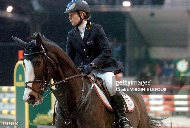 Australian Edwina Alexander on Isovlas Pialotta clears a hurdle to place second in the Grand Prix in the International Jumping of Brussels, 13...