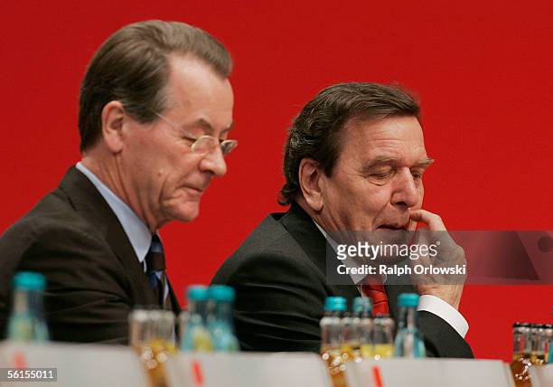 Franz Muentefering , party leader of the Social Democratic Party and German Chancellor Gerhard Schroeder attend the three-day party convention of the...