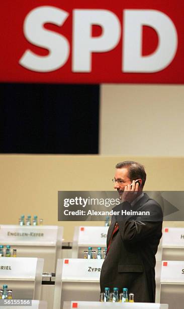 Matthias Patzeck uses his mobilephone during a three-day party conference of the Social Democratic Party at the Messehalle on November 14, 2005 in...