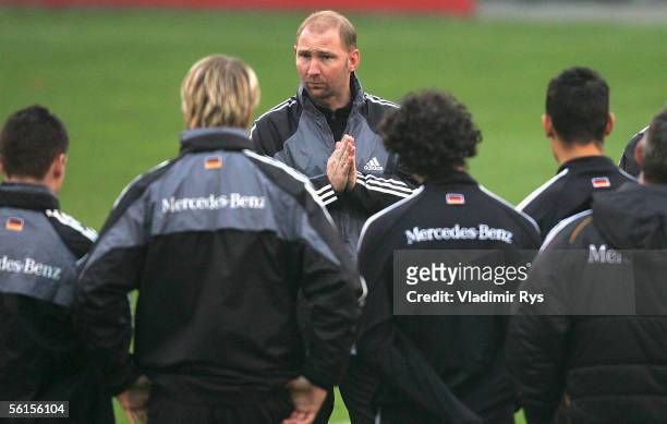 Coach Dieter Eilts of Germany speaks to his players during the U21 training session at Kleine Bayarena Stadium on November 14, 2005 in Leverkusen,...