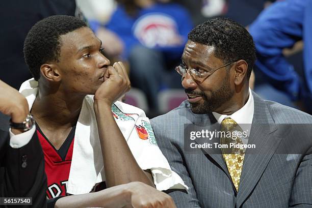 Head coach Sam Mitchell of the Toronto Raptors looks towards Chris Bosh on the bench against the Detroit Pistons November 5, 2005 at the Palace of...