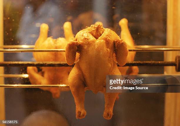grilled chicken - rotisserie stock pictures, royalty-free photos & images