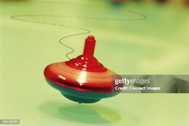 spinning top - trottola foto e immagini stock