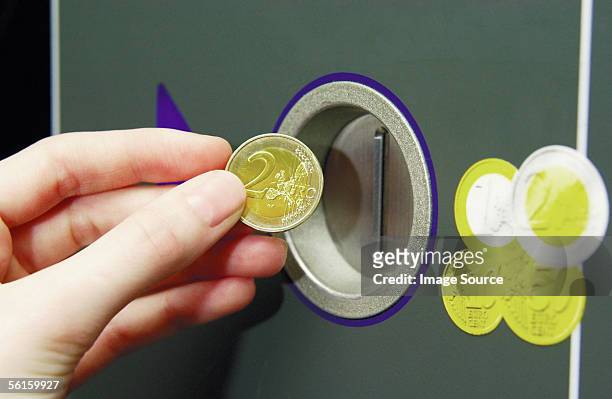 machine accepting euro coins - two hundred euro banknote stock pictures, royalty-free photos & images
