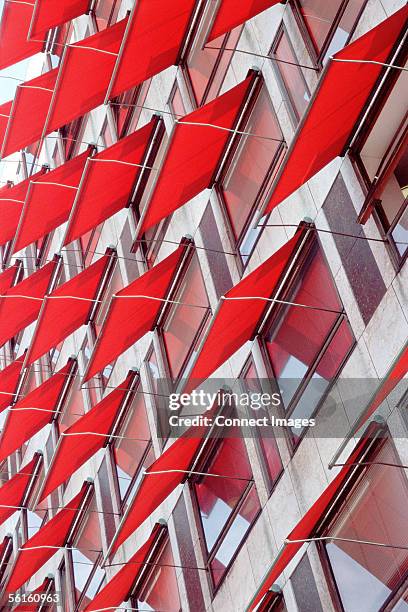 awnings on apartment windows - awning stock pictures, royalty-free photos & images