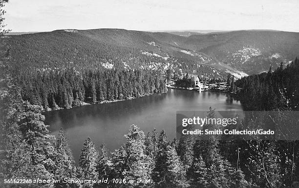 Mummelsee view over a lake in a mountain valley mountainside of the Hornisgrinde in the Northern Black Forest of Germany Schwarzwaldhochstrasse, or...