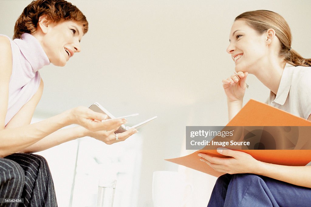 Two women talking