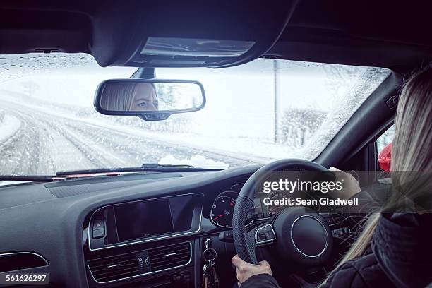 rural drive snowing - winter car window stock pictures, royalty-free photos & images