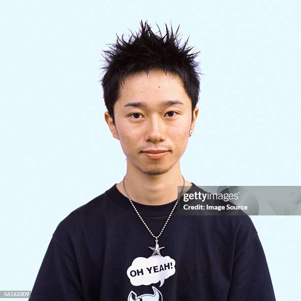portrait of a teenage boy - spiky hair stock-fotos und bilder