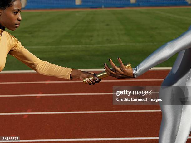 Female Relay 104 Black Female Relay Runner Stock Photos, High-Res Pictures, and ...