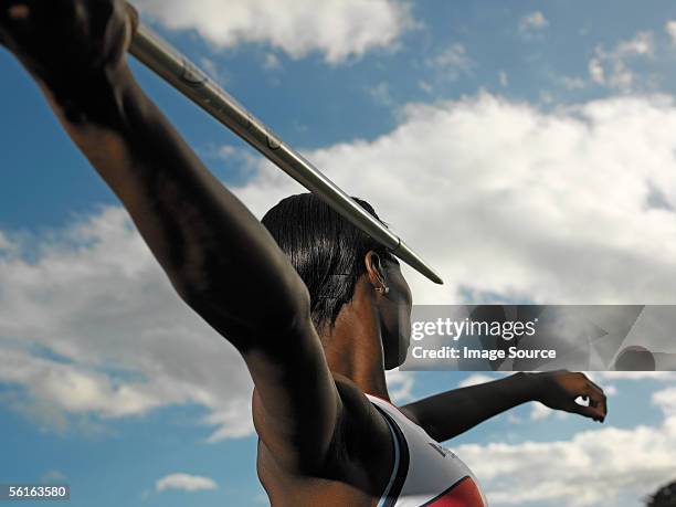 female javelin thrower - lancer du javelot photos et images de collection