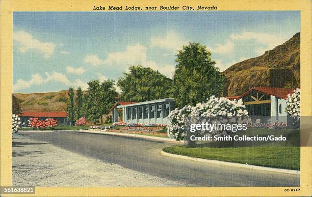 The reception drive up of Lake Mead lodge, with flowering trees, at Boulder City, Nevada, 1927.