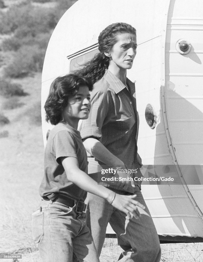 Dimmitra Panchito Gomez and Dimitra Arliss walking arm in arm, 1977. News Photo ...