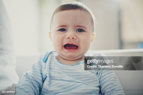 baby crying - babies stock pictures, royalty-free photos & images