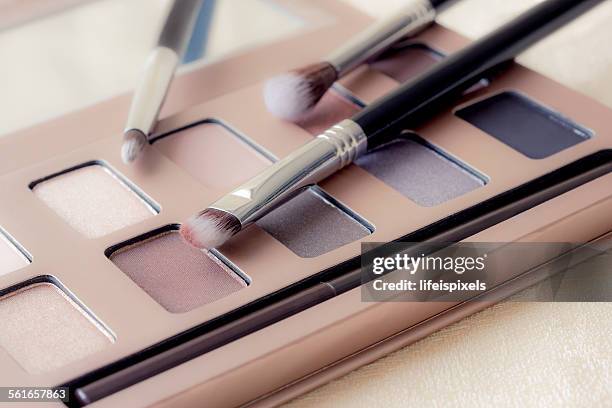 close-up of an eyeshadow palette and brushes - lifeispixels stock pictures, royalty-free photos & images