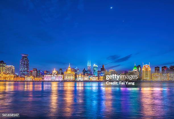 skyline of the bund at night - french concession stock pictures, royalty-free photos & images
