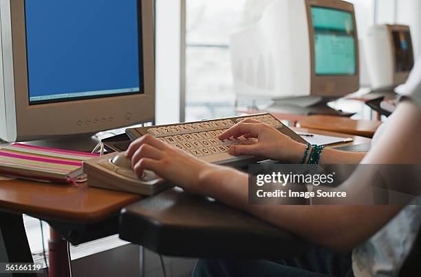 someone using a specially adapted computer - accessibility keyboard stock pictures, royalty-free photos & images