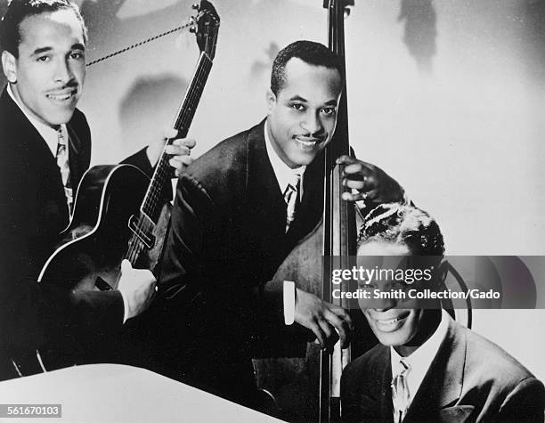 Singer and Jazz musician Nat King Cole, Oscar Moore and Wesley Prince, 1949.