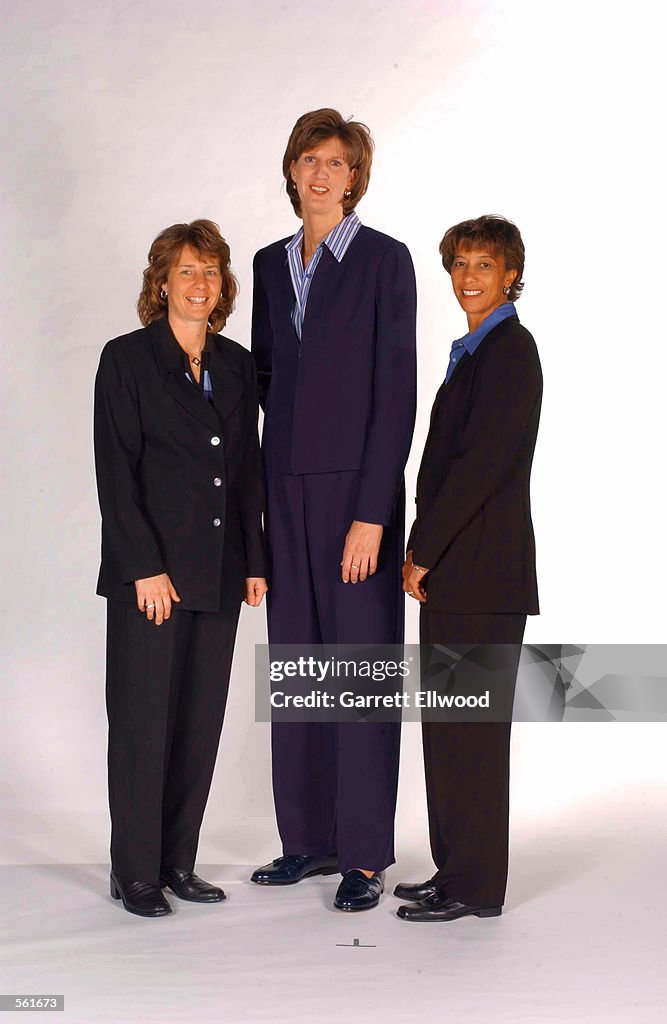 Head Coach Anne Donovan of the Charlotte Sting poses with assistant coaches Cheryl Reeve and Yrudi Lacey during WNBA media day at the Charlotte Hornets training facility in Fort Mill, South Carolina.