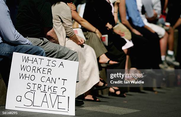 People take part in a demonstration opposing the Australian Federal Government's planned new industrial relations laws November 15, 2005 in Sydney,...