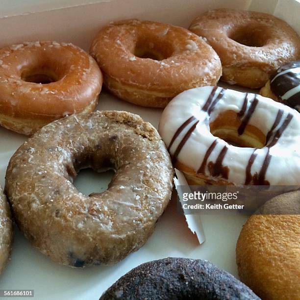 national donut day - snuggly stock pictures, royalty-free photos & images