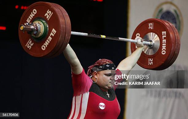 Agata Wrobel of Poland competes during the Women's +75kg category at the World Weightlifting Championships in Doha, 15 November 2005. Liu Chunhong of...