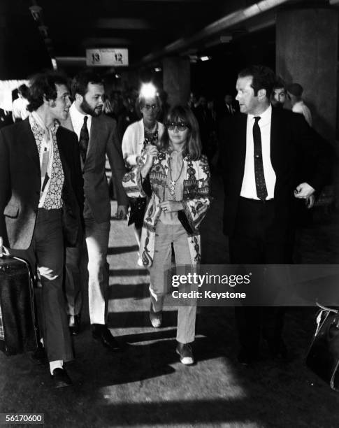 Cynthia Lennon, the wife of Beatle John Lennon, in tears at Euston Station after missing the train to Bangor, 25th August 1967. She had planned to...