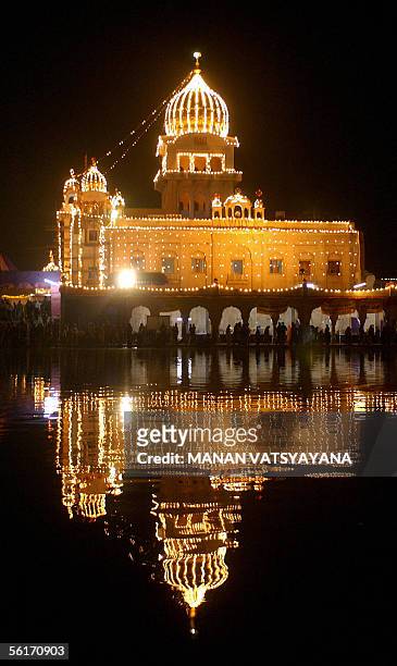 The Bangla Sahib Gurdwara is lit up in New Delhi, 15 November 2005 to mark the 536th birth anniversary of Guru Nanak Dev, the founder of Sikhism....