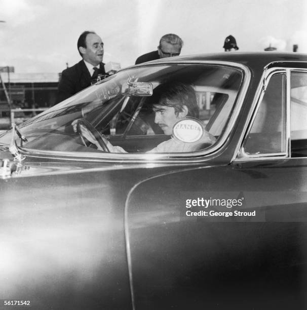 George Harrison of the Beatles at London Airport, 26th October 1966.