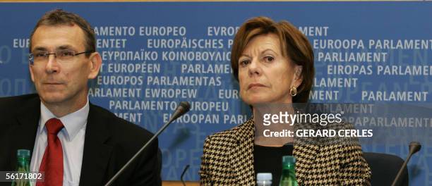 Energy commissioner, Latvian Andris Piebalgs and EU competition commissioner, Dutch Neelie Kroes are pictured during a press conference inside of the...