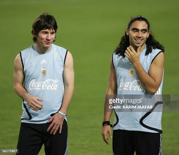 Argentinian players Lionel Messi and Juan Pablo Sorin attend a training session 15 November 2005 at the Al-Sadd stadium in Doha. The Argentinian...