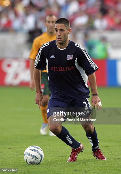 Clint Dempsey of the New England Revolution moves the ball at midfield during MLS Cup 2005 against the Los Angeles Galaxy at Pizza Hut Park on...