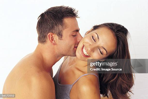 Couple Kissing High-Res Stock Photo - Getty Images