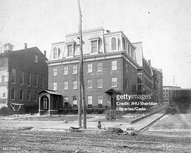 Administration Building, Old Campus looking southwest down Howard Street, Horse-drawn carriage in background, Johns Hopkins University, Baltimore,...