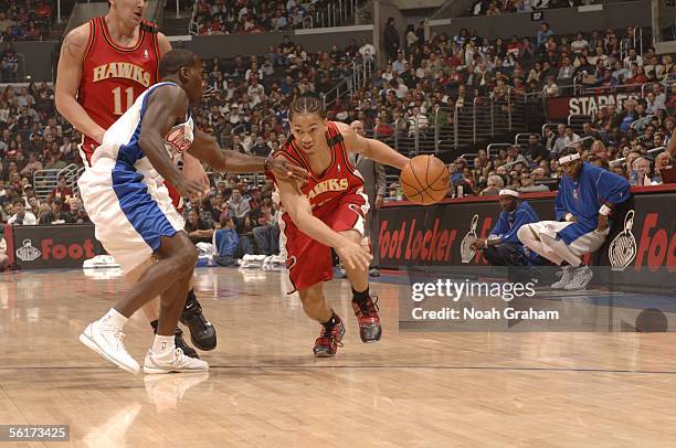 Tyronn Lue of the Atlanta Hawks drives against Anthony Goldwire of the Los Angeles Clippers November 4, 2005 at Staples Center in Los Angeles,...