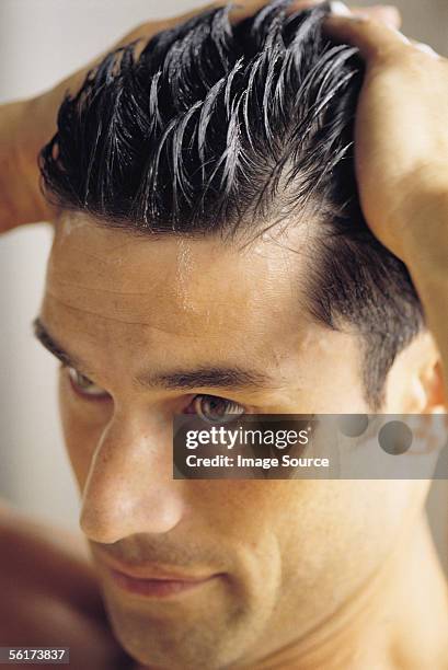 hairstyling - hair gel stock pictures, royalty-free photos & images