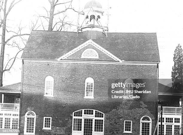 Barn exterior, looking east, Tinted, under remodeling, scaffolding around cupola, Johns Hopkins University Homewood Campus, Baltimore, Maryland, 1920.