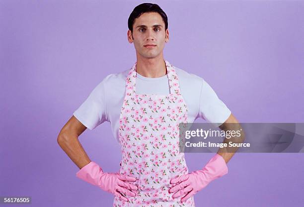 man in apron and rubber gloves - house husband stock pictures, royalty-free photos & images