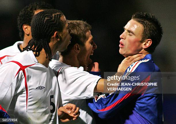 English Anton Ferdinanad , Gary O'Neil and Kieran Richardson argue with French Anthony Le Tallec during the under-21 Euro 2006 qualifier football...